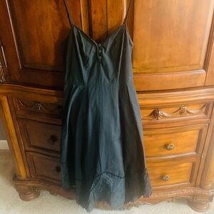 Elegant Black Dress with Lace Hem